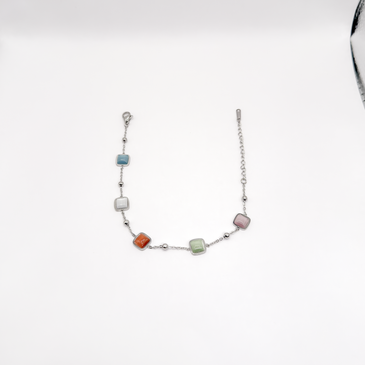 Pulsera plateada con piedras cuadradas de ojo de gato multicolor