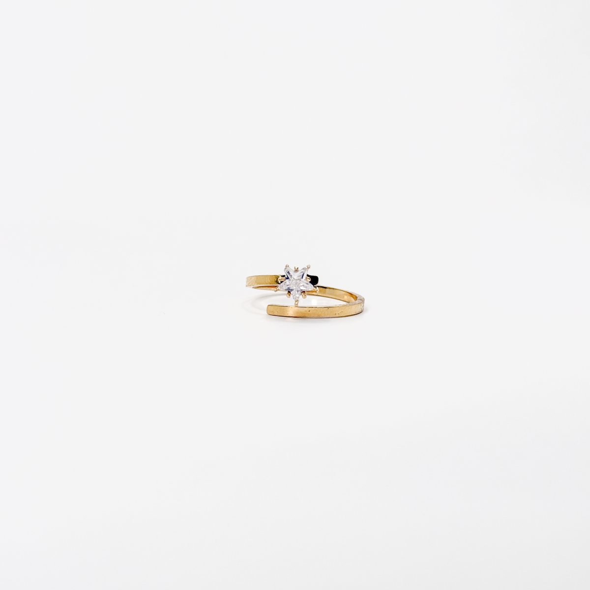 Anillo dorado de acero inoxidable con zirconia en forma de estrella y diseño giratorio
