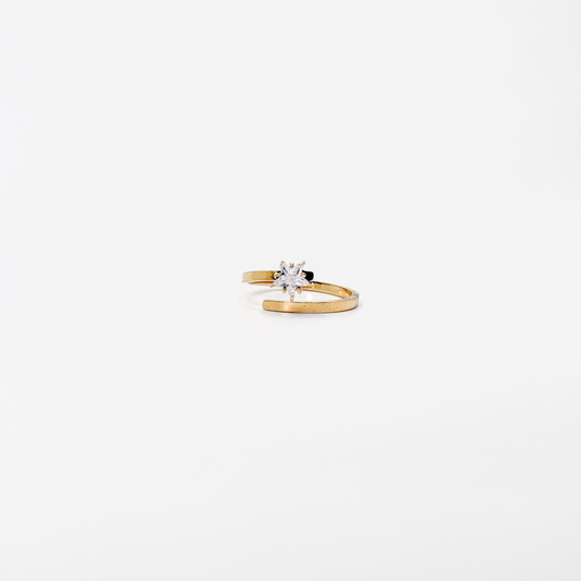 Anillo dorado de acero inoxidable con zirconia en forma de estrella y diseño giratorio
