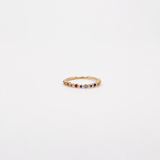 Anillo dorado de chapa de oro con zirconias multicolor