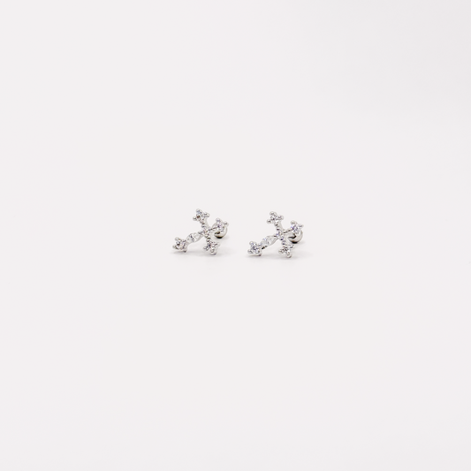 Broqueles plateados de cruz con zirconias