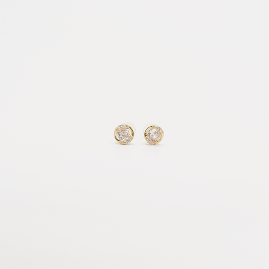 Broqueles mini dorados con zirconia ovalada y contorno brillante