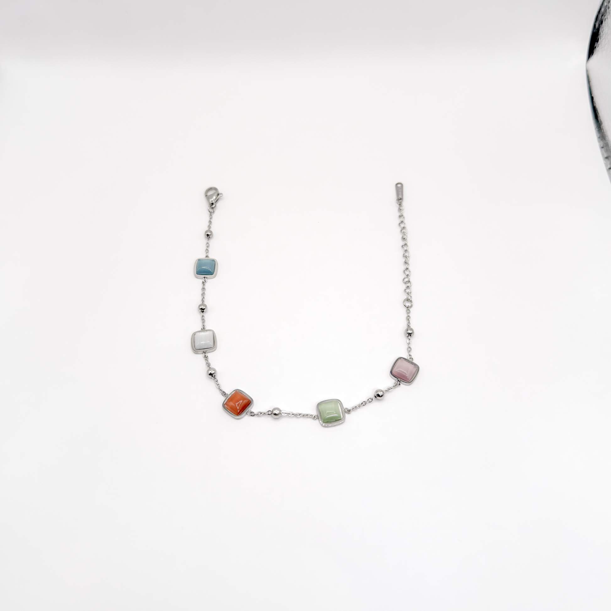 Pulsera plateada con piedras cuadradas de ojo de gato multicolor
